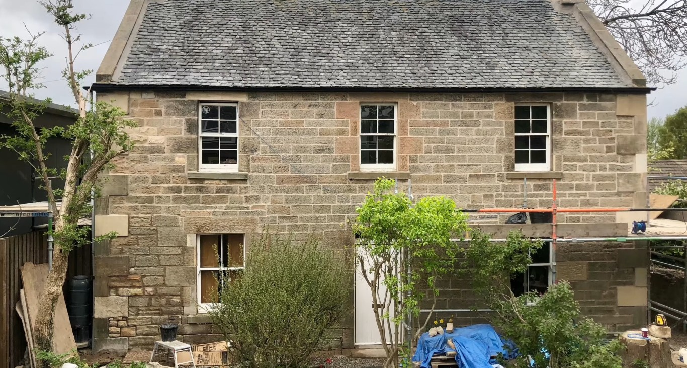 Commercial masonry services for businesses featuring historic brick building restoration in Oceanside area